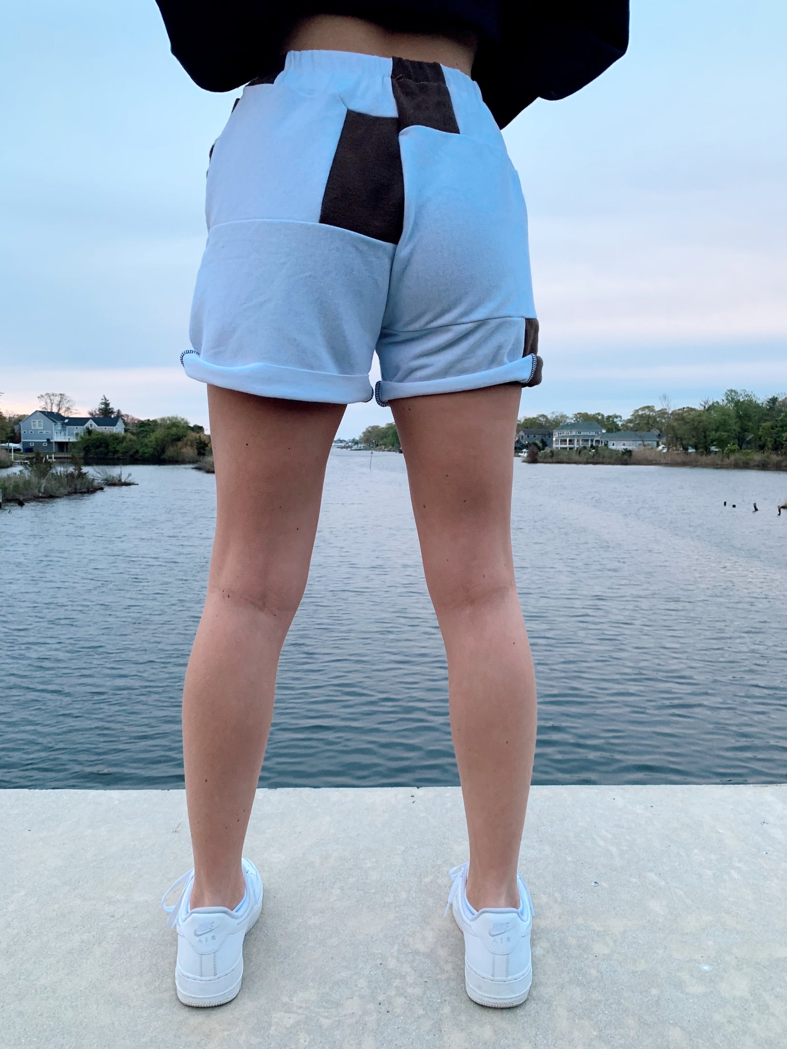 brown & white nike patchwork shorts